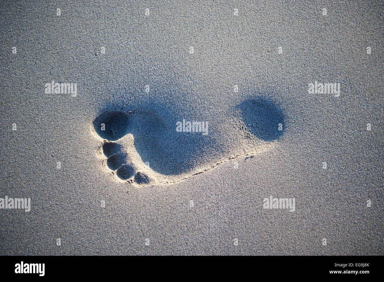 Footprint in the sand, on the beach, Greece Stock Photo