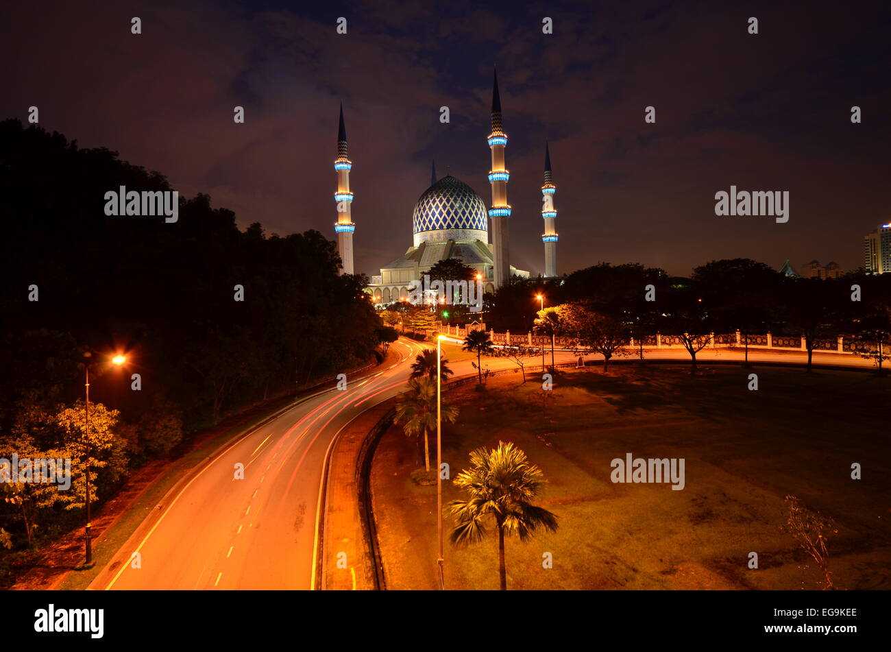 Malaysia, Shah Alam, Sultan Salahuddin Abdul Aziz Shah Mosque at night and illuminated road Stock Photo