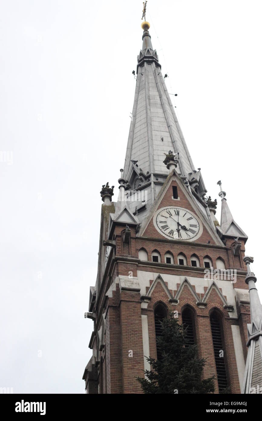 Church Clock Tower in Arad, Romania Stock Photo