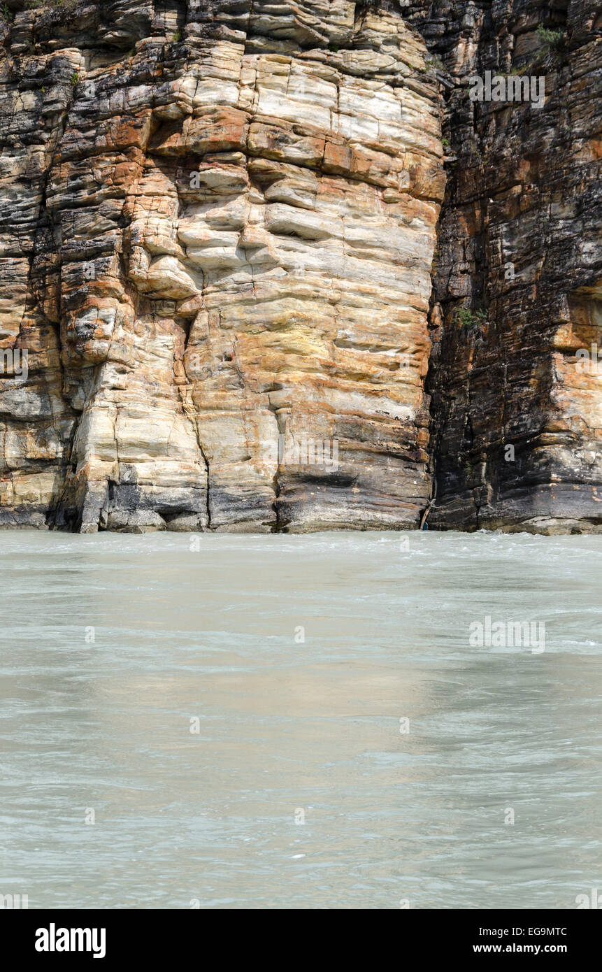 layered rocks on the Athabasca River in Canada Stock Photo