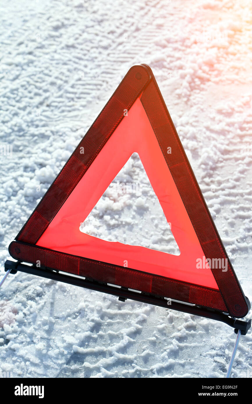 Warning triangle on road Stock Photo - Alamy