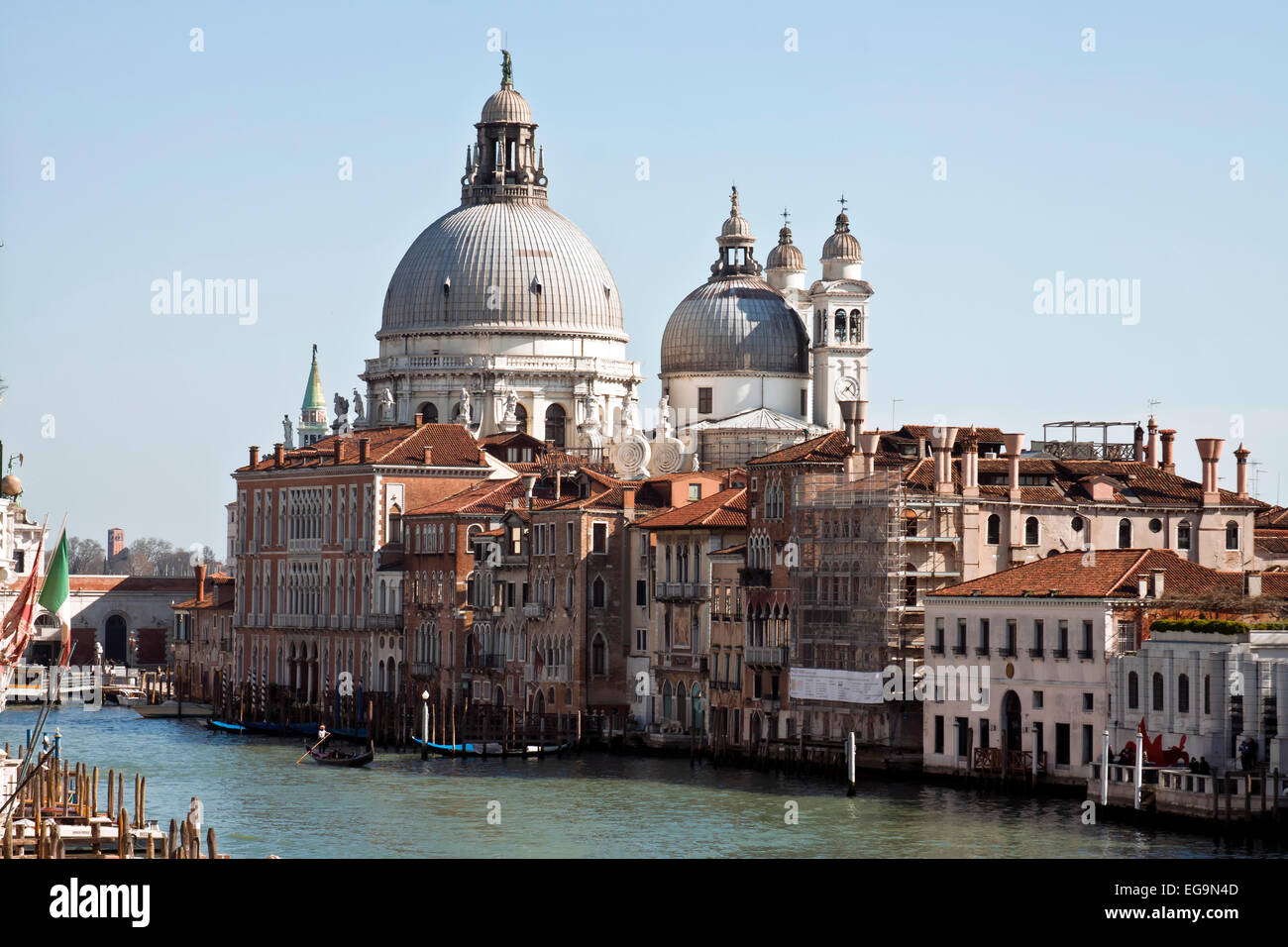 Venice, Italy-February 24, 2014:Grand Canal and Basilica Santa Maria della Salute.The Grand Canal is a canal in Venice, Italy. I Stock Photo