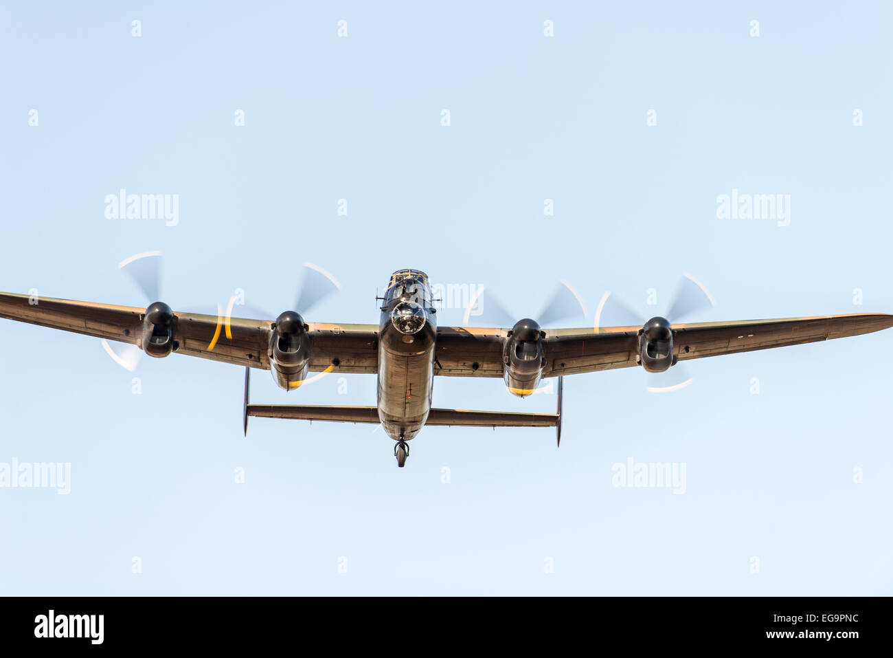 Avro Lancaster, from underneath, against pale sky Stock Photo