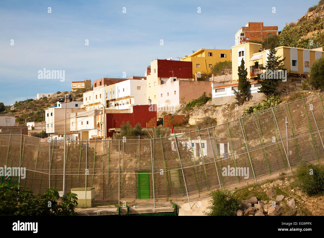 High security fences separate the Spanish exclave of Melilla, Spain from Morocco, north Africa, January 2015 Stock Photo