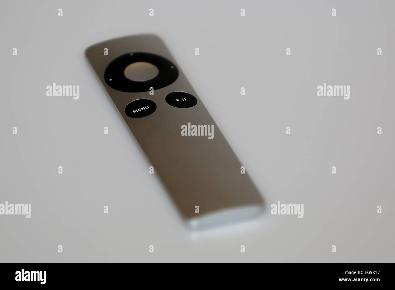 Apple TV universal remote control on a plain background Stock Photo Alamy