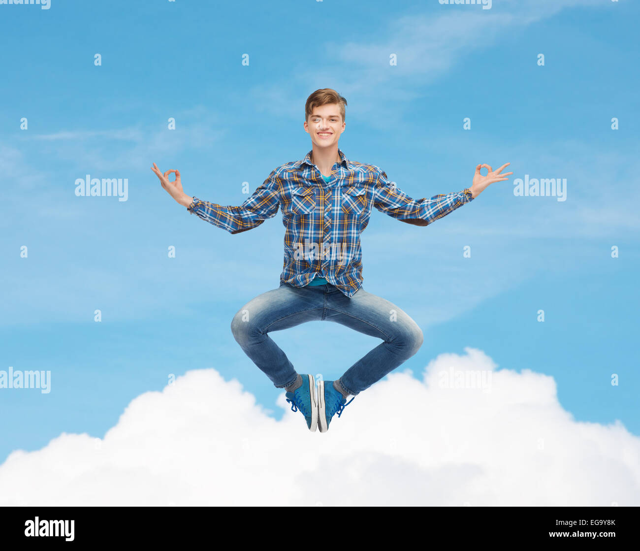 smiling young man flying in air Stock Photo Alamy