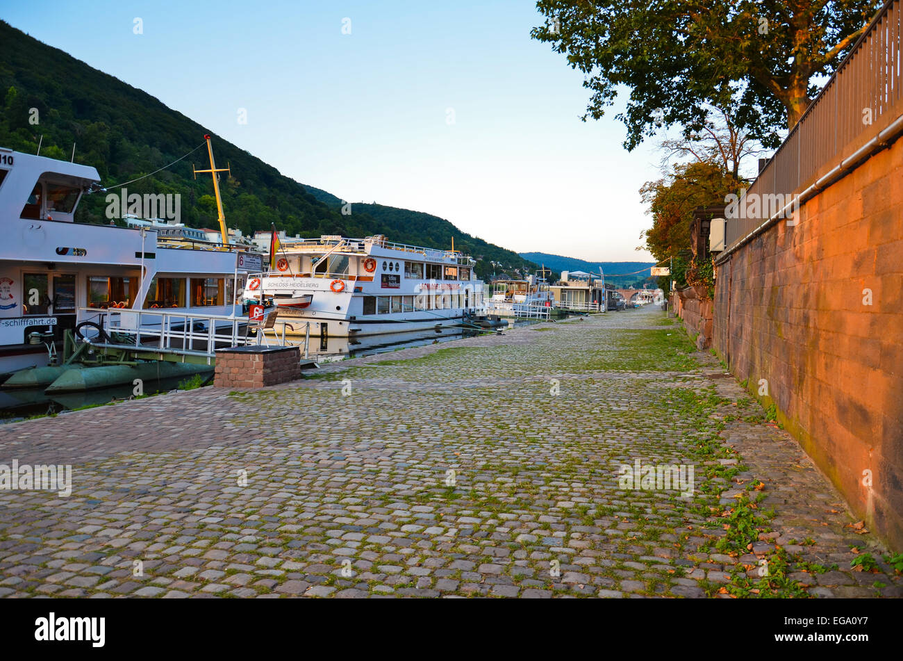 Boats anchored along the bank of the river Stock Photo