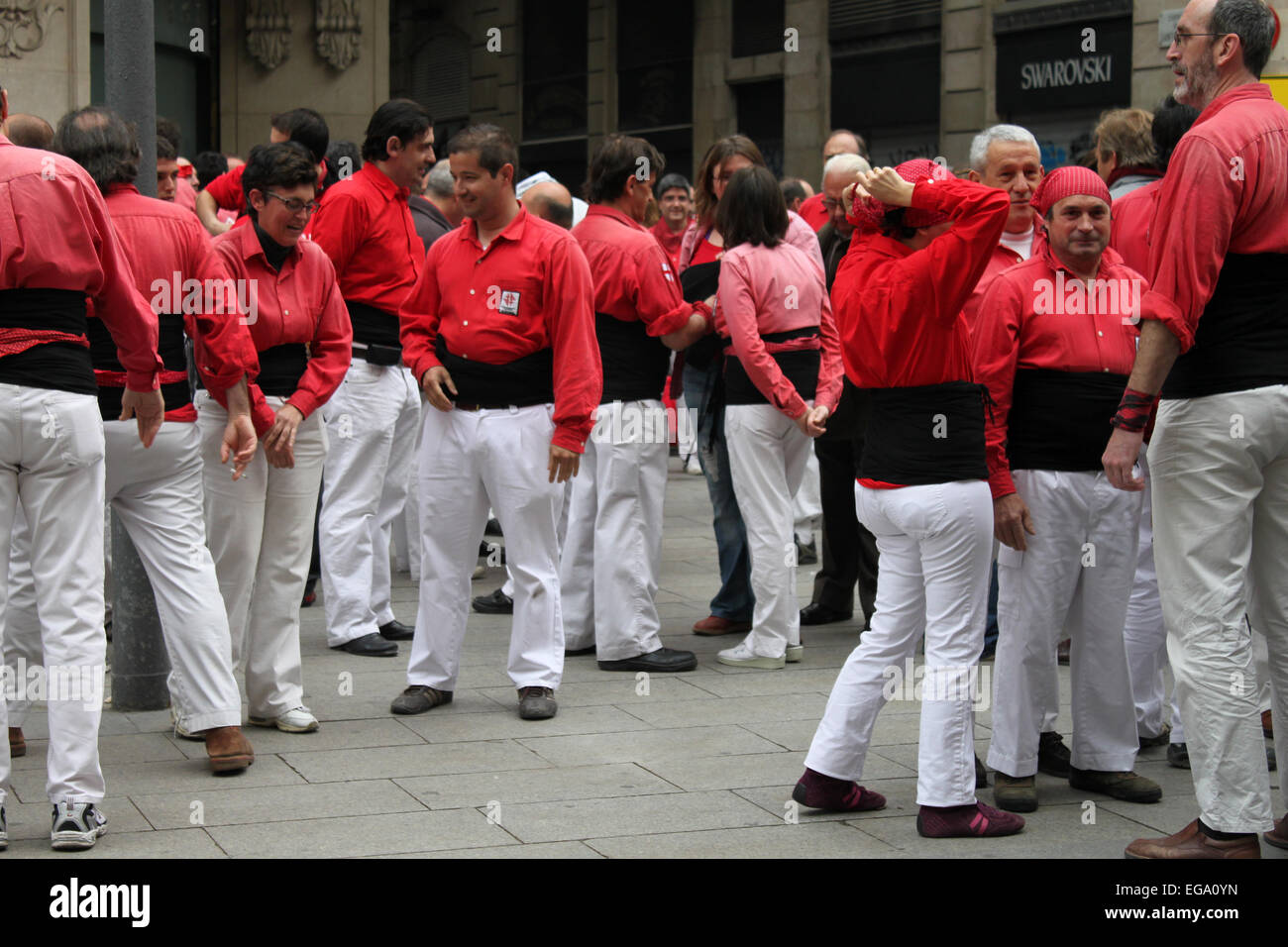 Group of Castellers before beginning to build human towers in Portal de l'Àngel, Barcelona, Catalonia, Spain Stock Photo