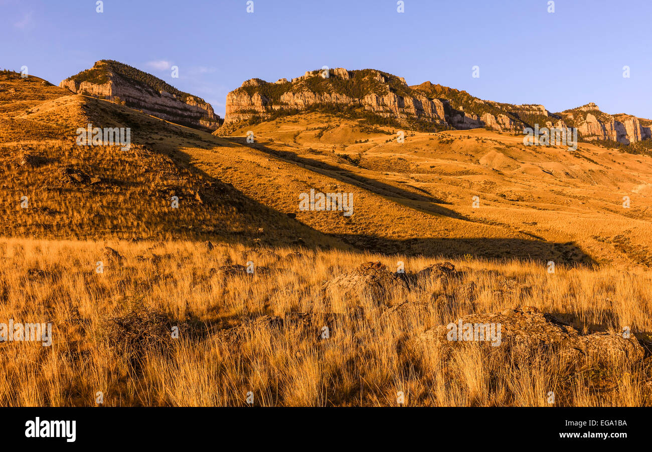 the rugged undulating landscape of Buffalo Bill State park showing the rocky mountains near Cody, Wyoming, USA. Stock Photo