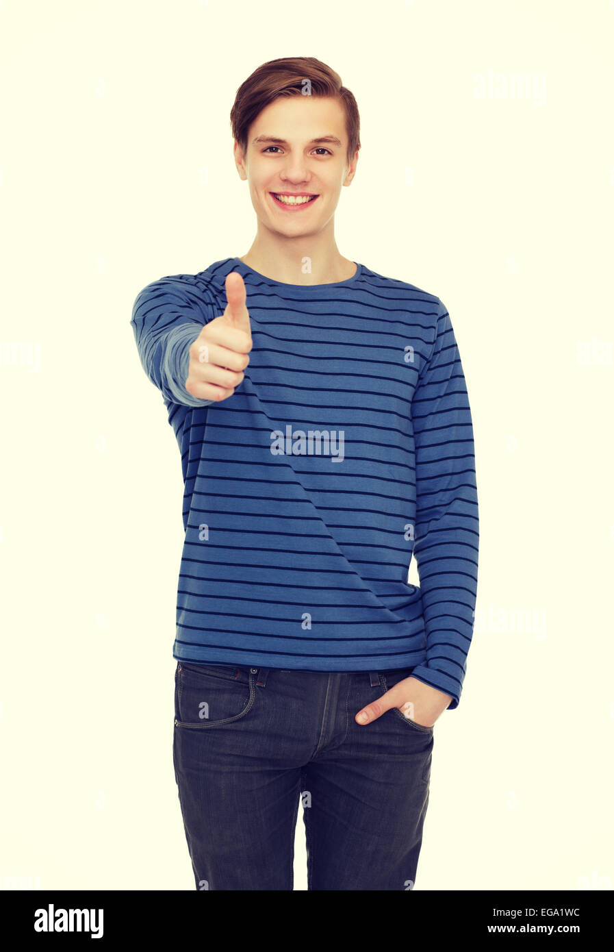 smiling teenage boy showing thumbs up Stock Photo - Alamy