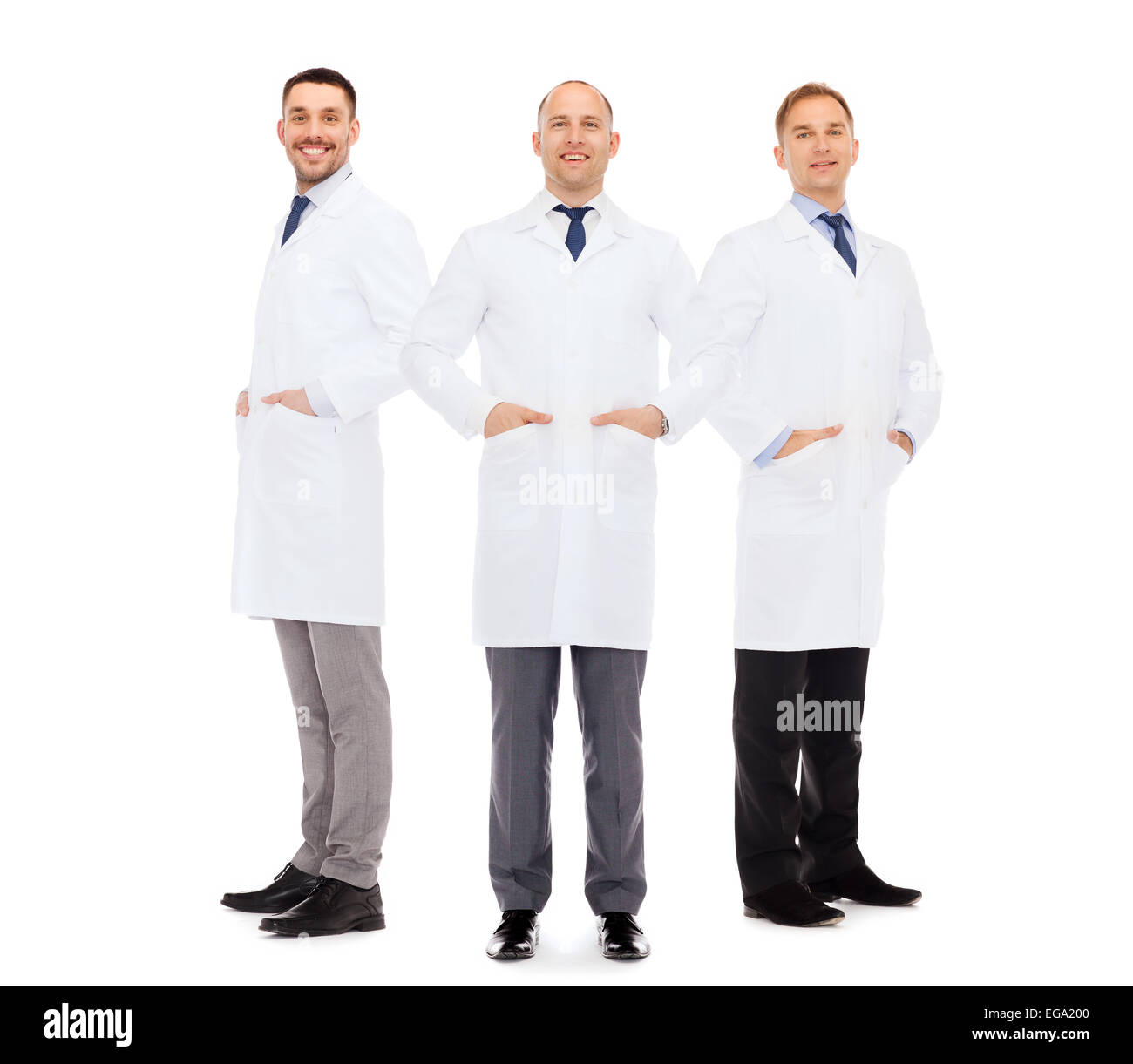 smiling male doctors in white coats Stock Photo Alamy