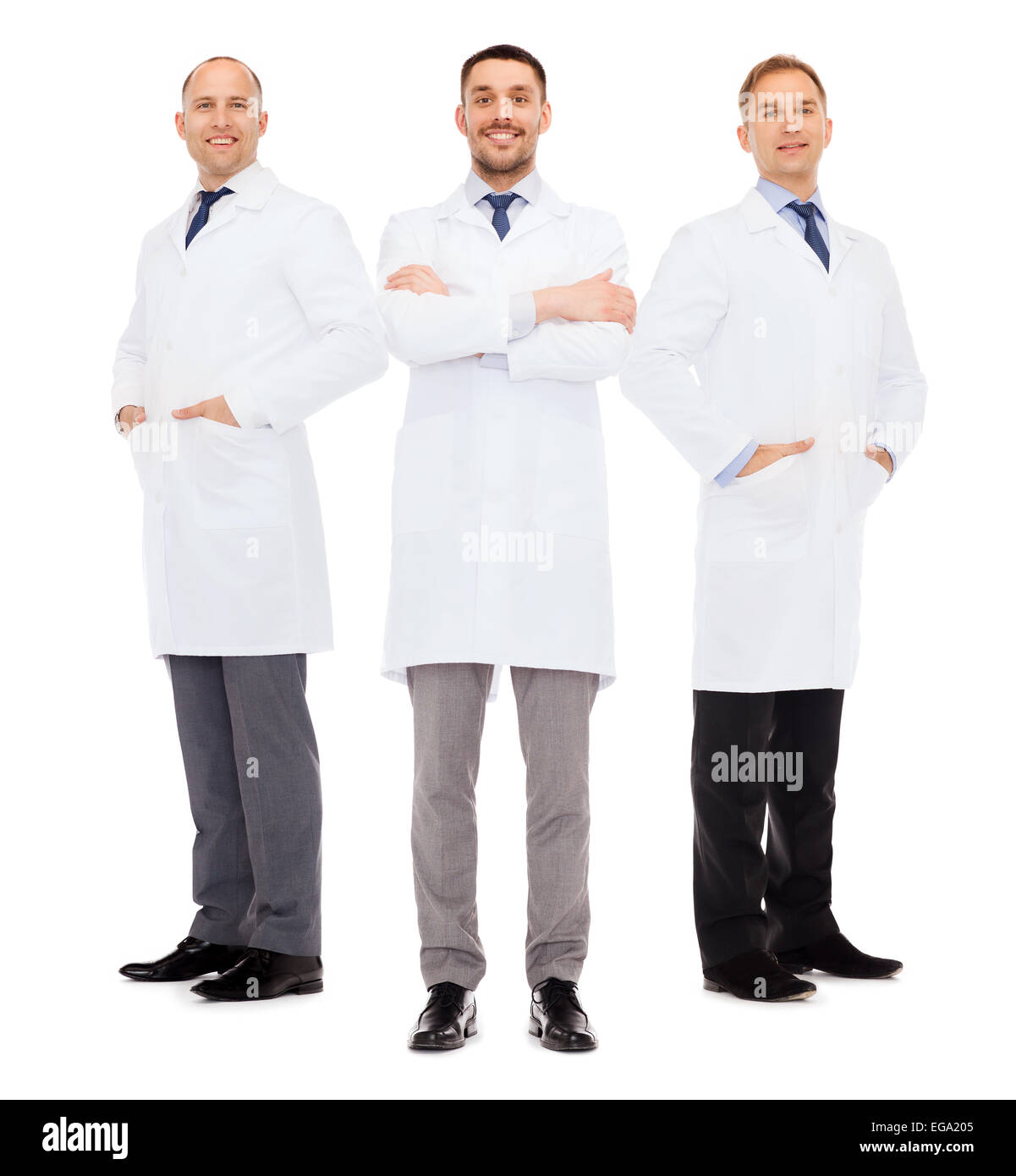 smiling male doctors in white coats Stock Photo Alamy