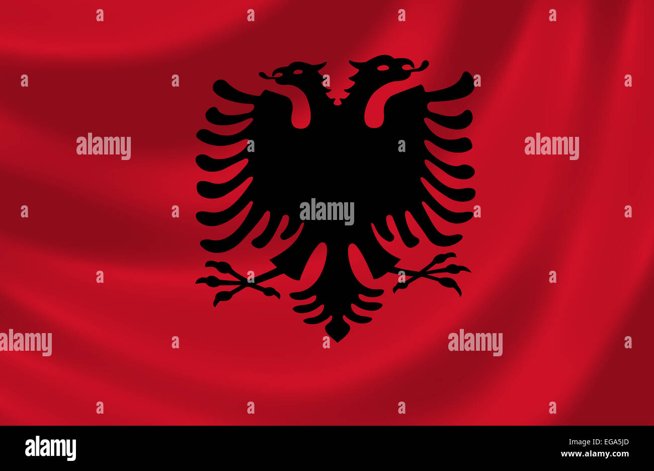Flag of Albania waving in the wind Stock Photo