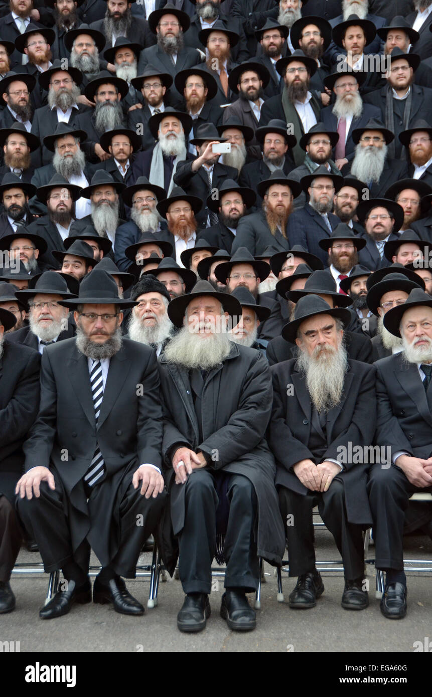 Some of the thousands of orthodox rabbis seated preparing for a group