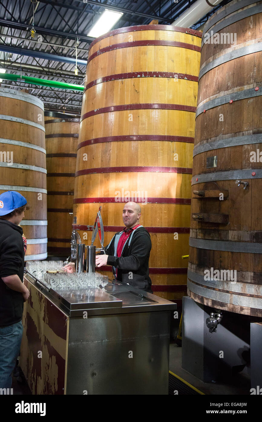 Fort Collins, Colorado A tour guide pours samples of beer for