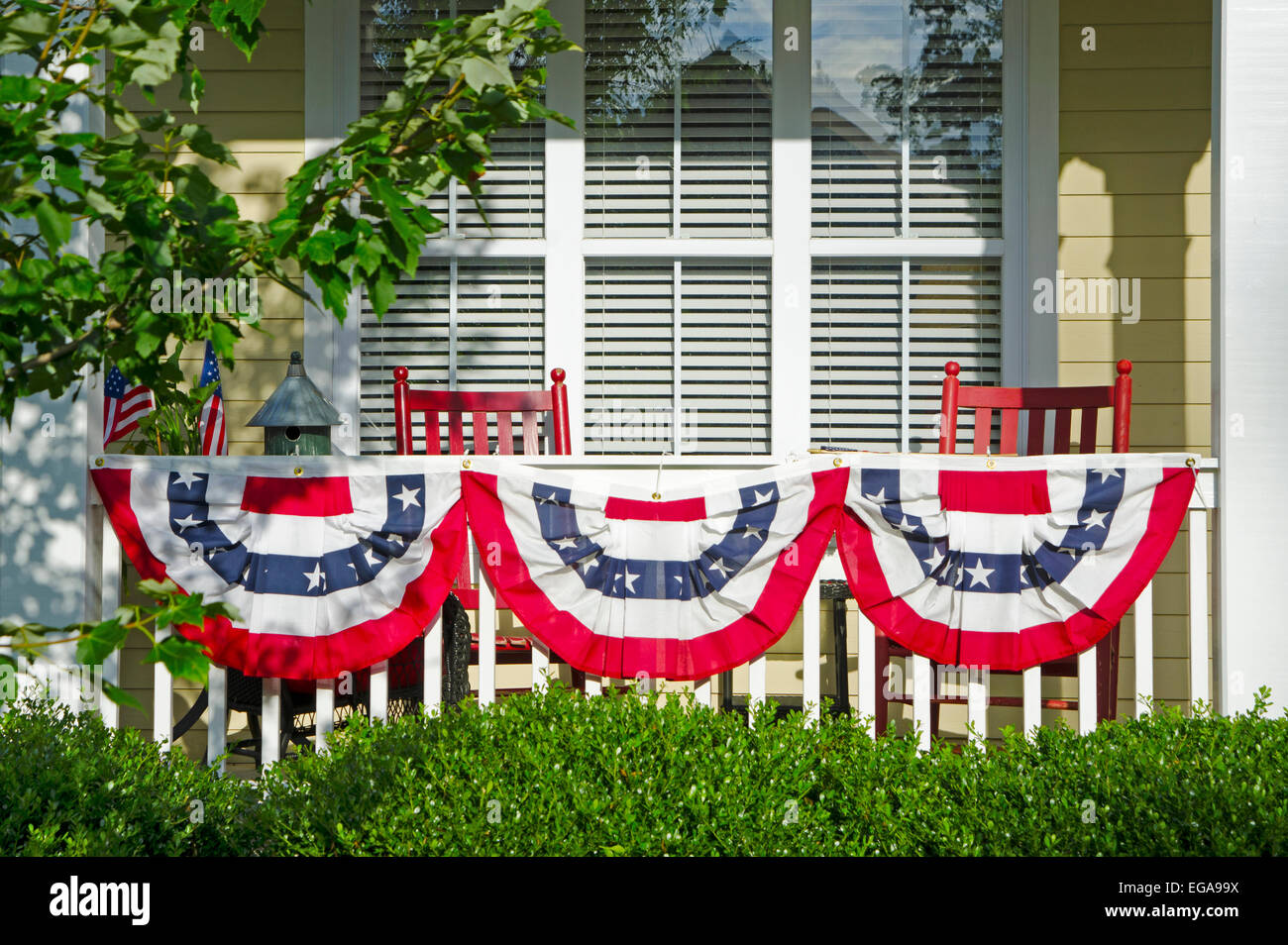 Porch with an American Flag Stock Photo - Alamy