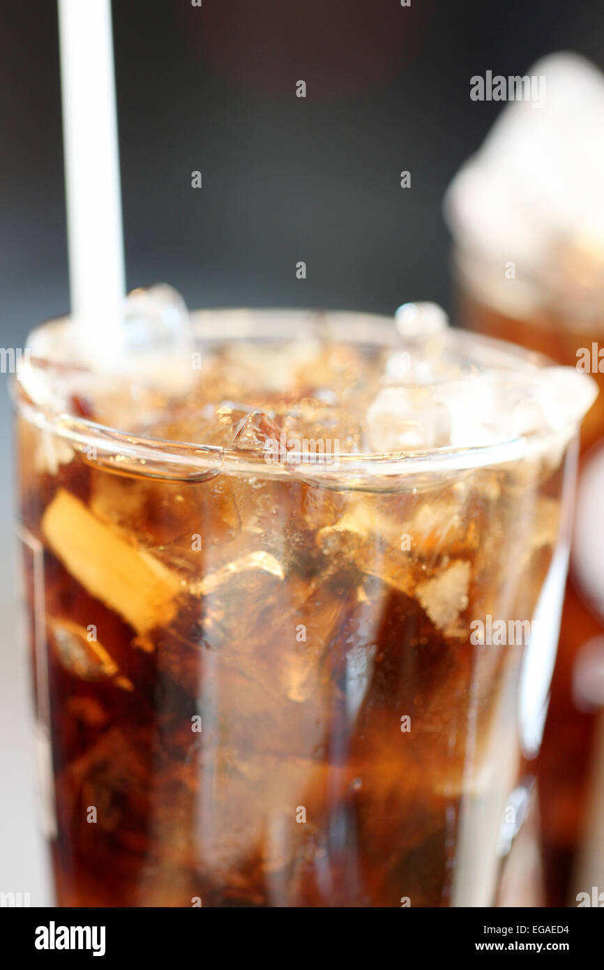 Ice cola drinks in glass for the beverage background. Stock Photo