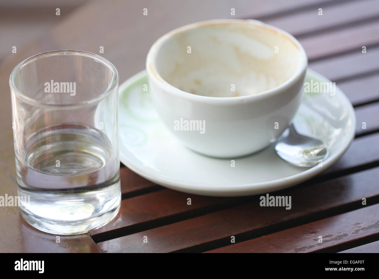 White coffee cup on brown wood table. Stock Photo