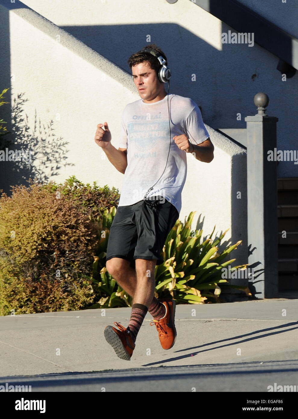 Zac Efron works up a sweat on his first day on set of his new movie 