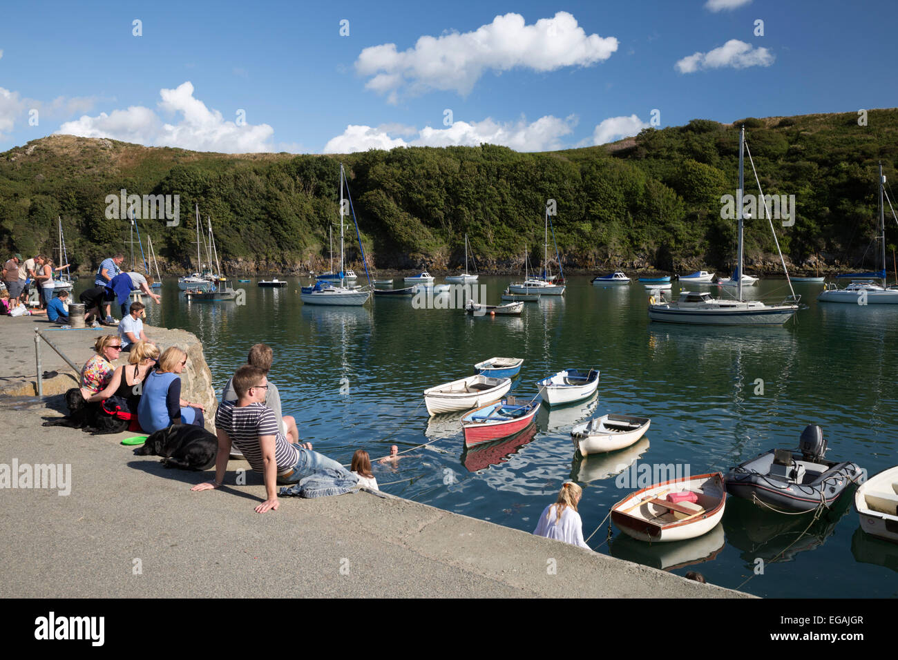 Tourists and boats in harbour, Solva, St Bride's Bay, Pembrokeshire, Wales, United Kingdom, Europe Stock Photo