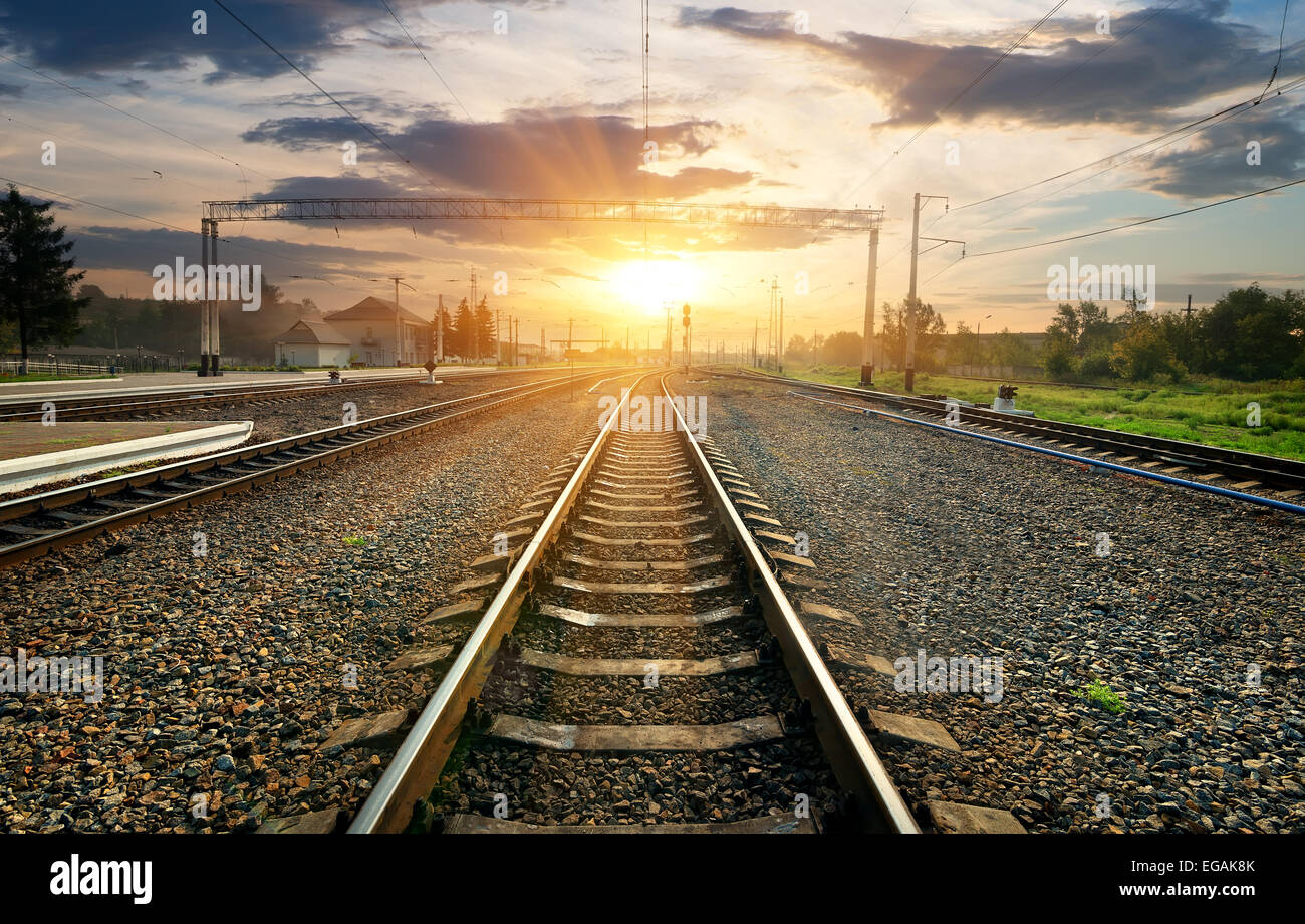 Railroad and small station at the sunset Stock Photo