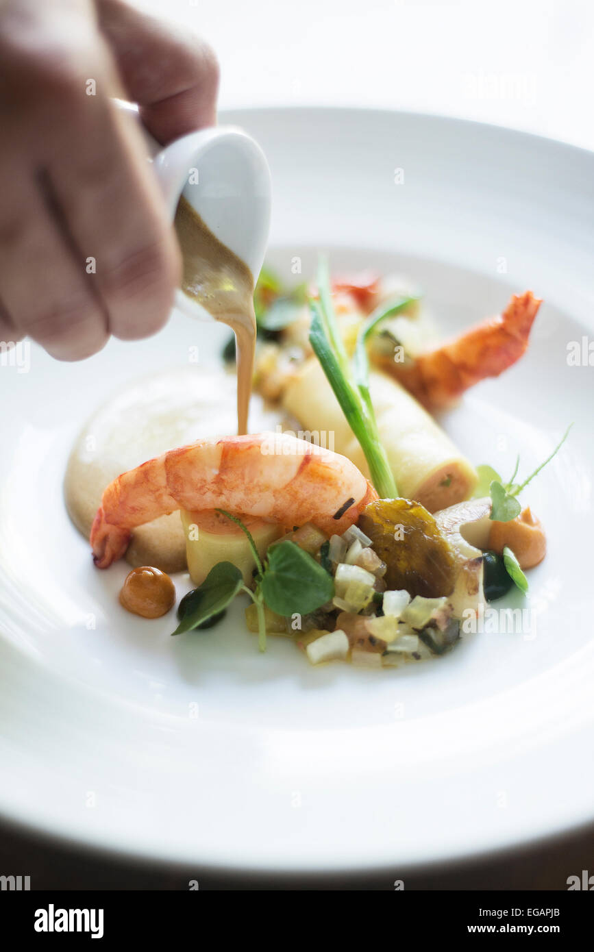prawns and grilled vegetables with pumpkin roll and mustard sauce Stock Photo