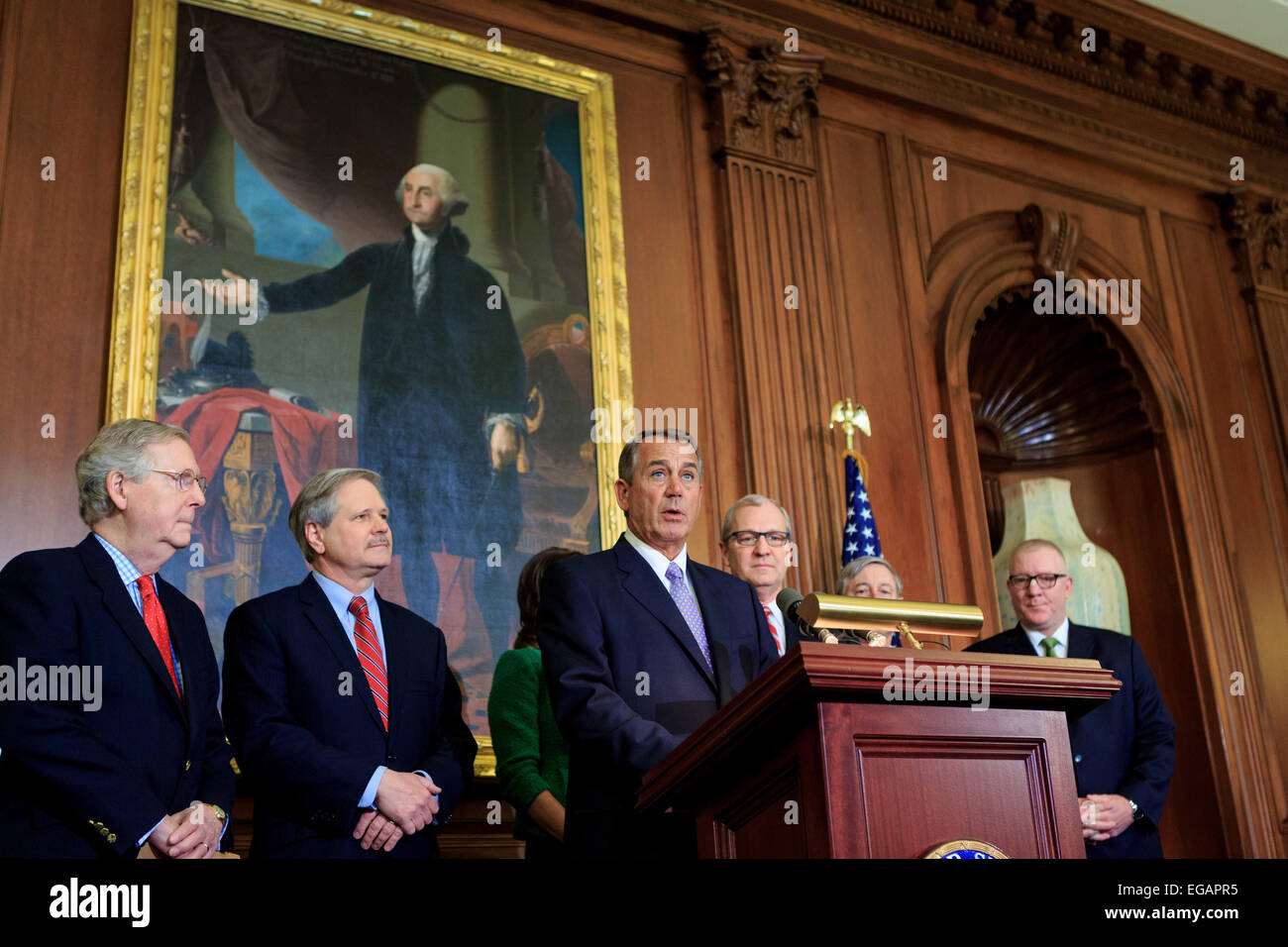 US Speaker of the House John Boehner speaks during a signing ceremony for the bill approving the Keystone XL pipeline project at the U.S. Capitol February 10, 2015 in Washington, DC. Also pictured: Majority Leader Mitch McConnell, Senator John Hoeven, Representative Kristi Noem, Representative Kevin Cramer, Representative Fred Upton, and Sean McGarvey, president of North America's Building Trades Unions. Stock Photo