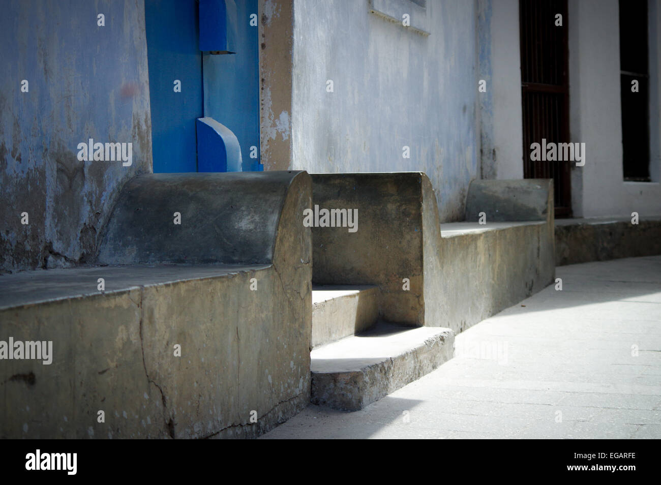 Typical Zanzibari townhouse with baraza benches - Stone Town, Zanzibar Stock Photo