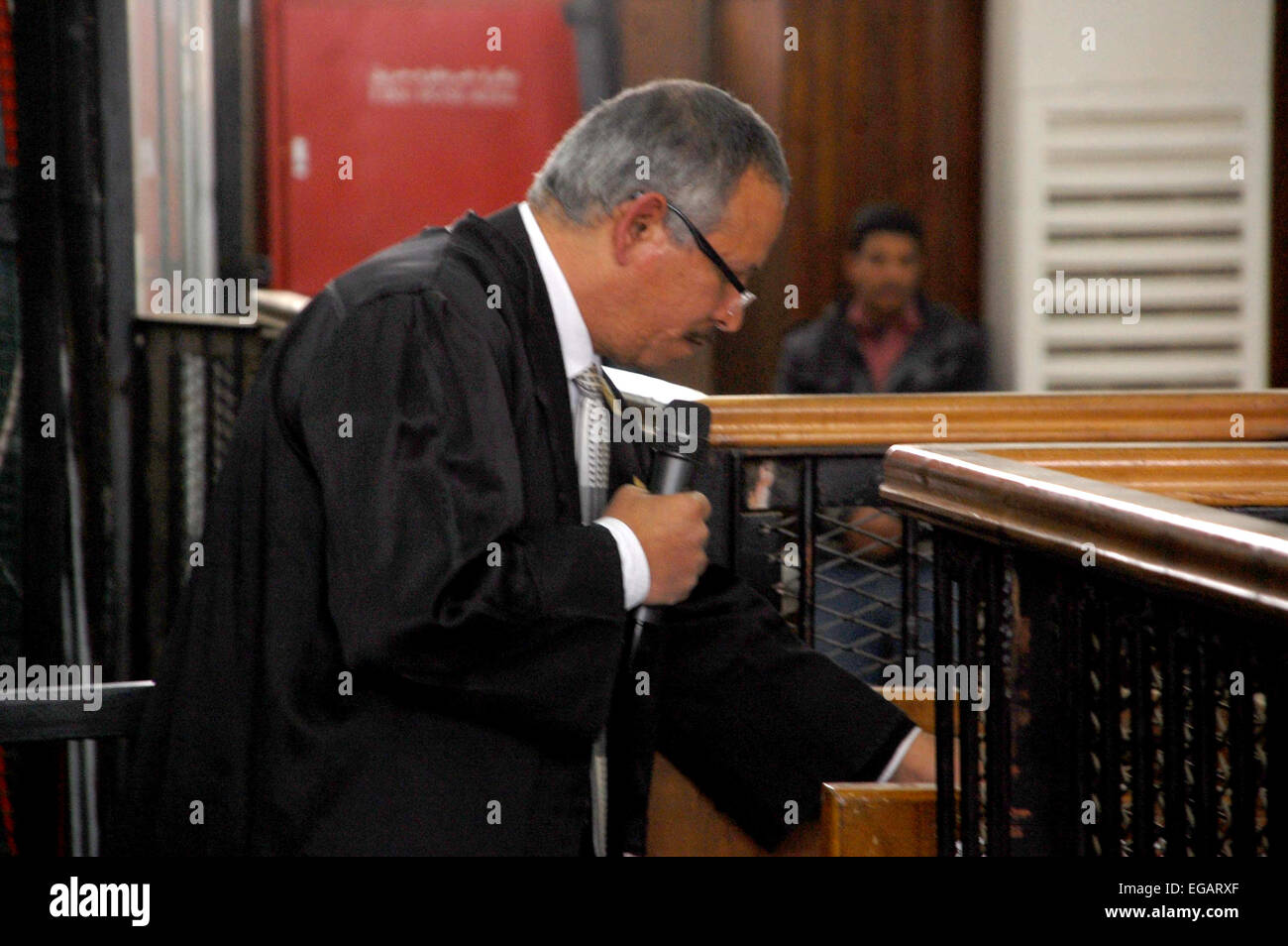 Cairo, Egypt. 21st Feb, 2015. A lawyer speaks to judges during the trial of suspects in the ''Rabaa Operation Room'' case, in Cairo on February 12, 2015. The prosecution accused the defendants of several charges relating to preparation of an operation room to guide the movement of the Muslim Brotherhood organization in order to confront the state and spread chaos in the country Rabaa and Al Nahda sit-in clearing, and also accused them of plotting to storm and burn police stations, private properties and churches © Stringer/APA Images/ZUMA Wire/Alamy Live News Stock Photo