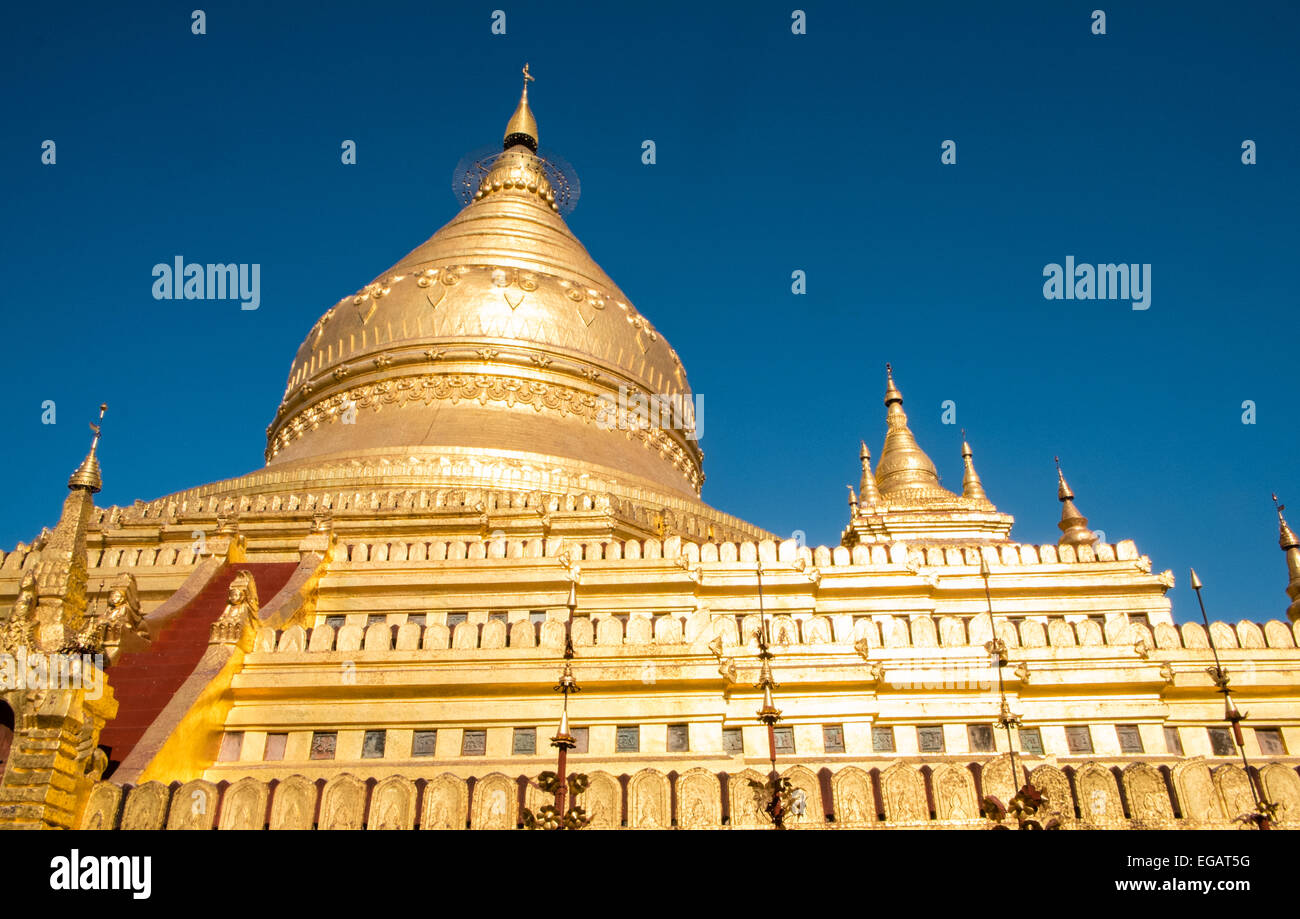 Blue sky and gold golden stupa at Shwezigon Buddhist pagoda, temple at Pagan,Bagan, Burma, Myanmar. Stock Photo