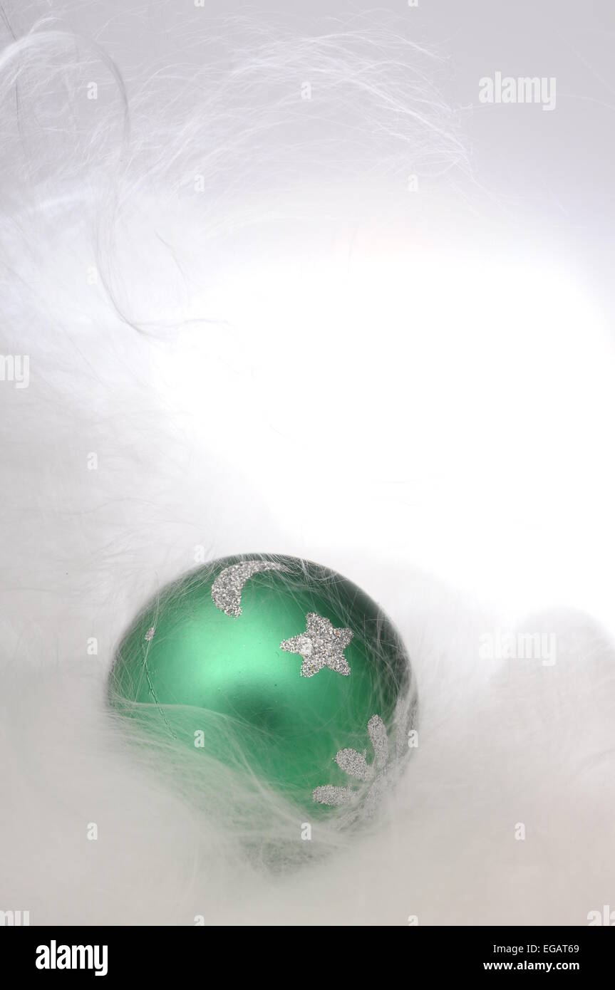 Green Christmas Balls On White Background Of Angel S Hair For