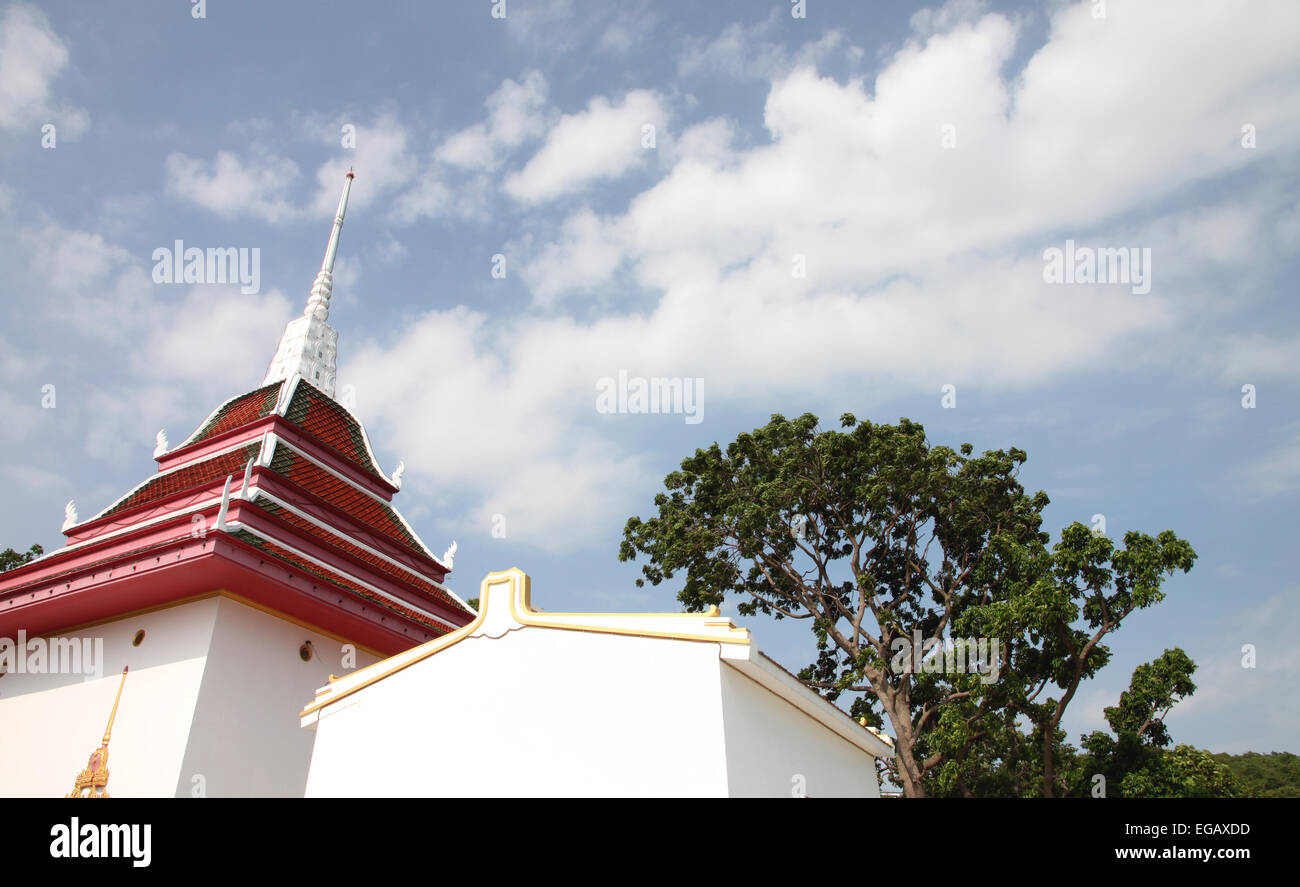 Roof of church in temple Thailand on blue sky background. Stock Photo