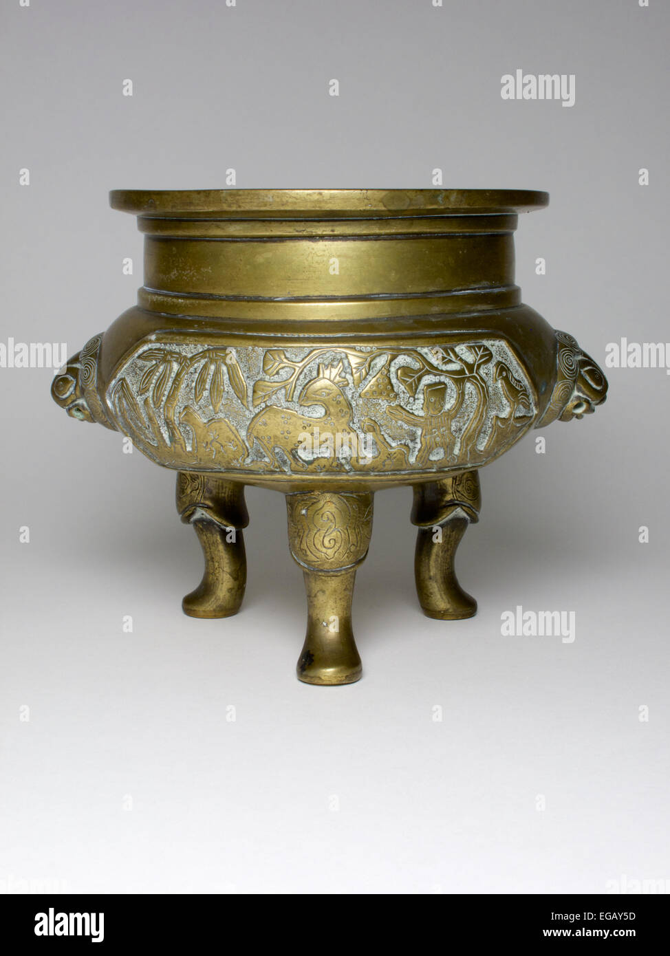 Antique 18th/19th century Chinese tripod bronze censer. Stock Photo