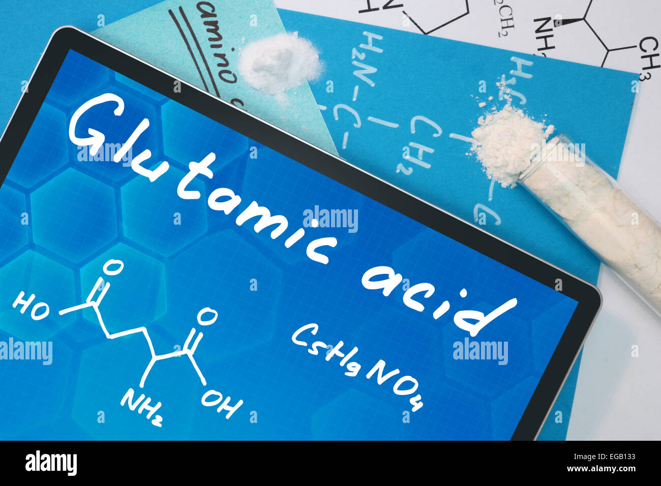 Tablet with the chemical formula of Glutamic acid. Amino acids Stock