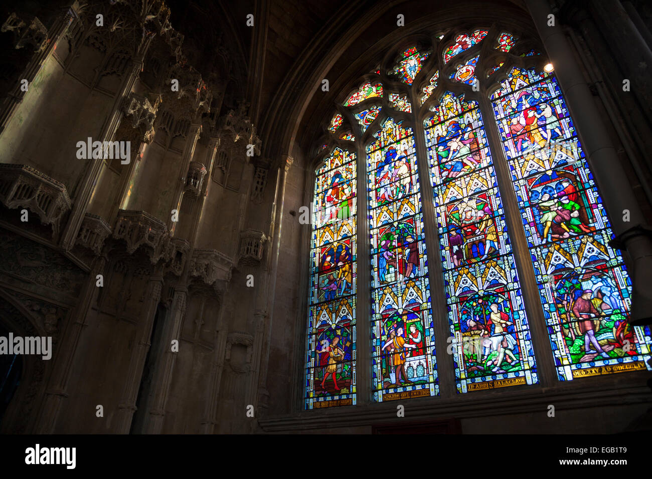 The interior of Ely Cathedral, detail of stained glass window Ely