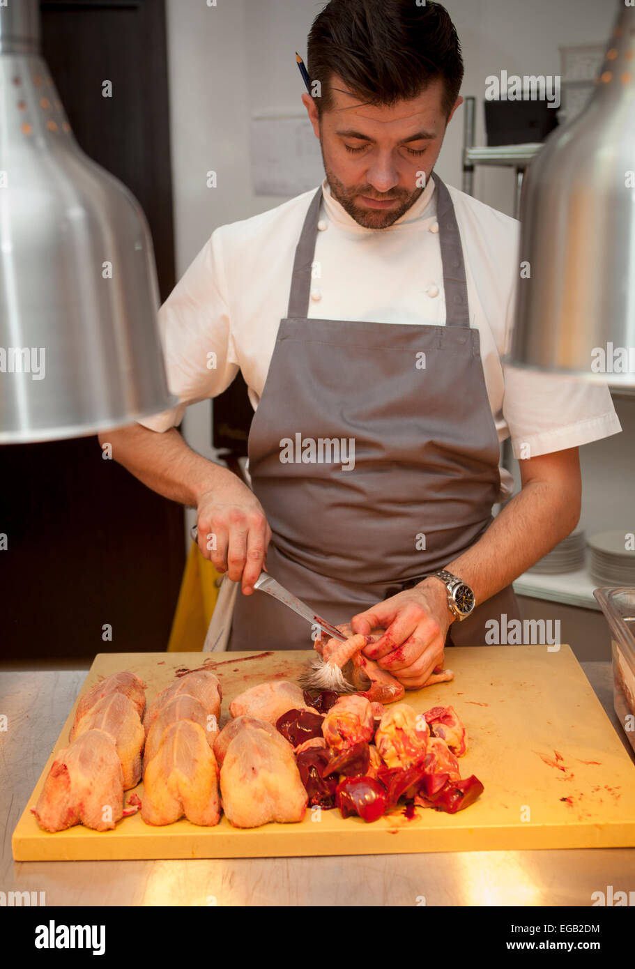 Chef Arnaud Stevens working in the kitchen at Sixty One Restaurant London Stock Photo
