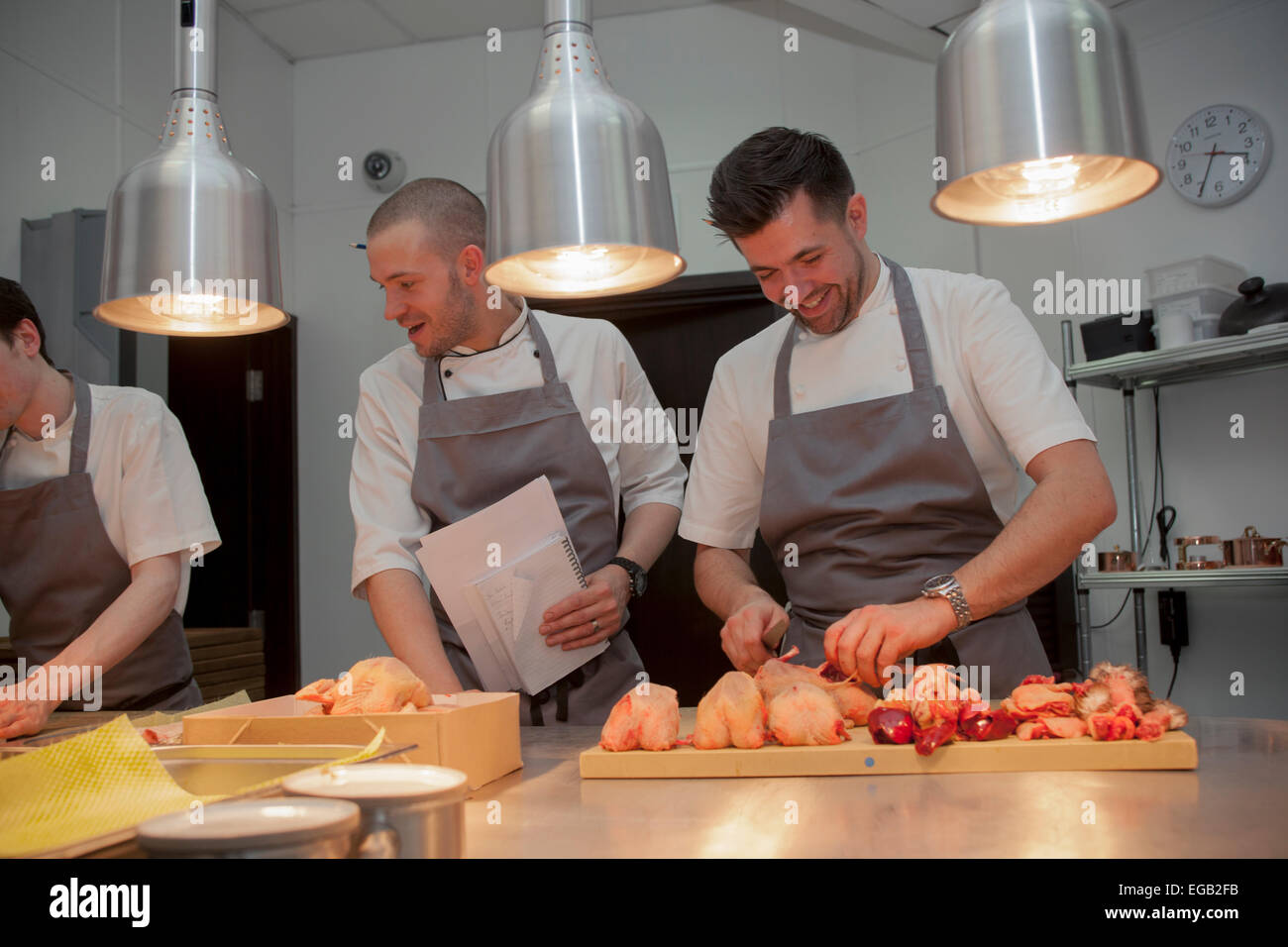 Chefs (including head chef Arnaud Stevens) in Kitchen at Sixty One Restaurant in London Stock Photo