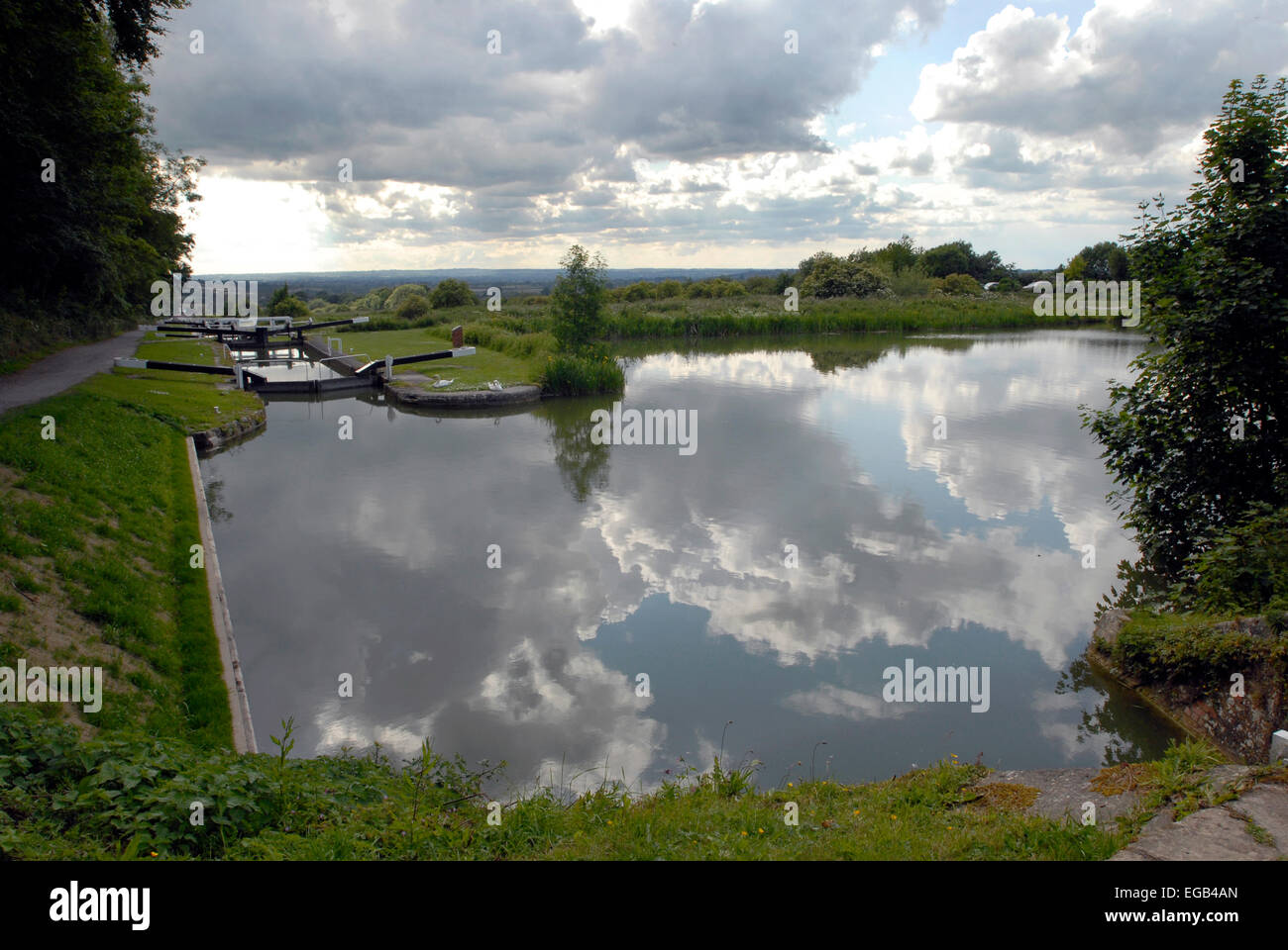 A side pond on the Kennet and Avon canal near Devizes Wiltshire England Stock Photo