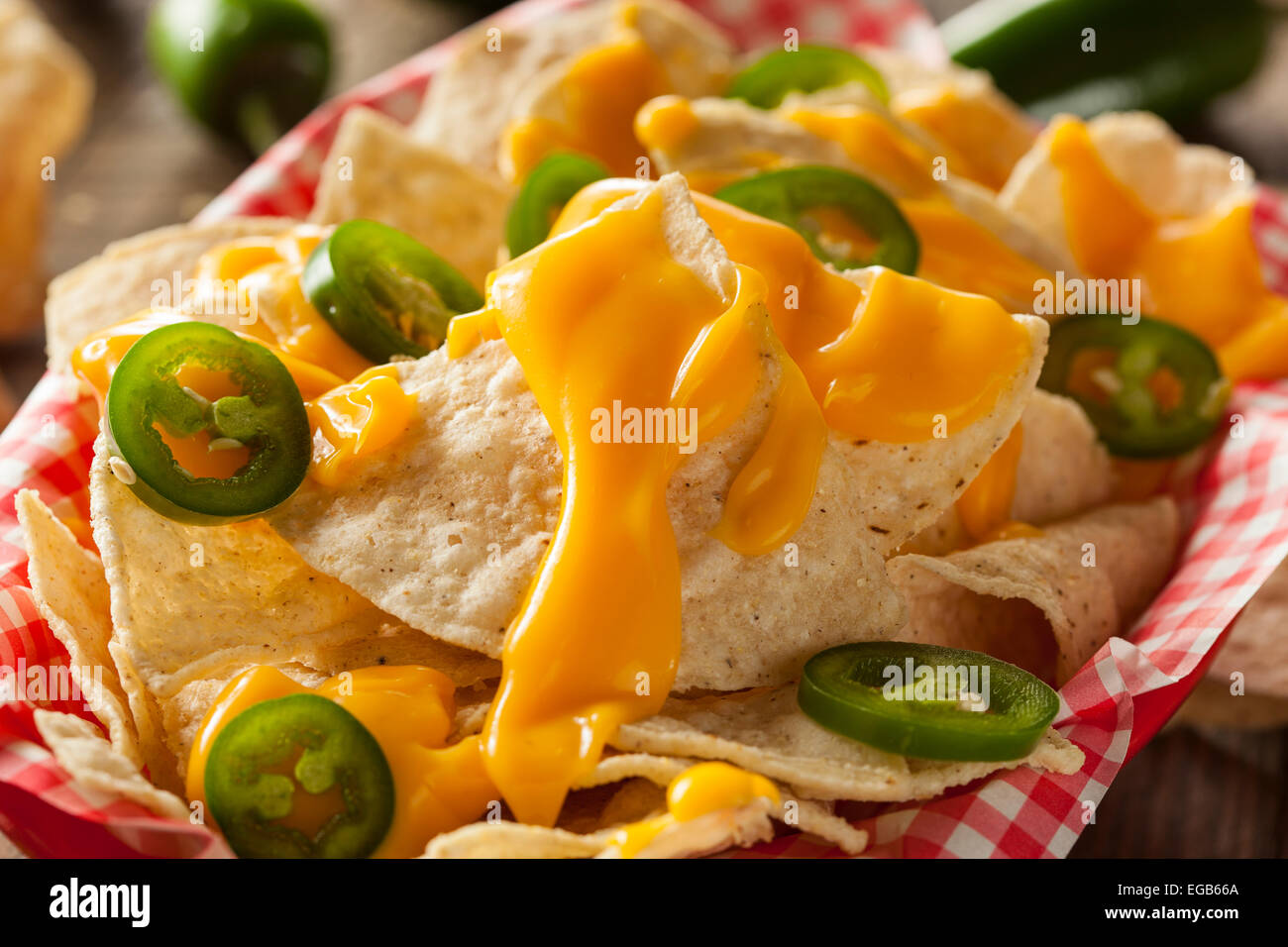 Homemade Nachos with Cheddar Cheese and Jalapenos Stock Photo Alamy
