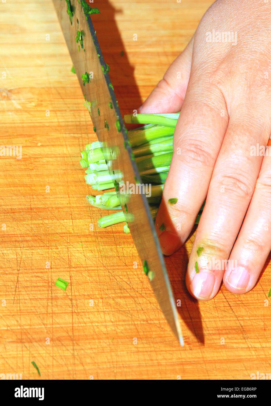 Process of chopping garlic sprouts Stock Photo Alamy