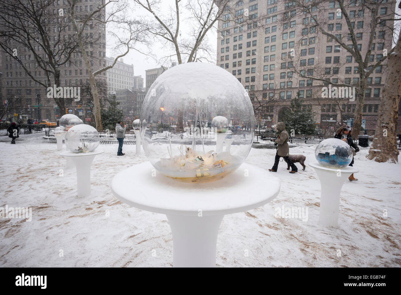 Visitors to Madison Square Park in New York view 