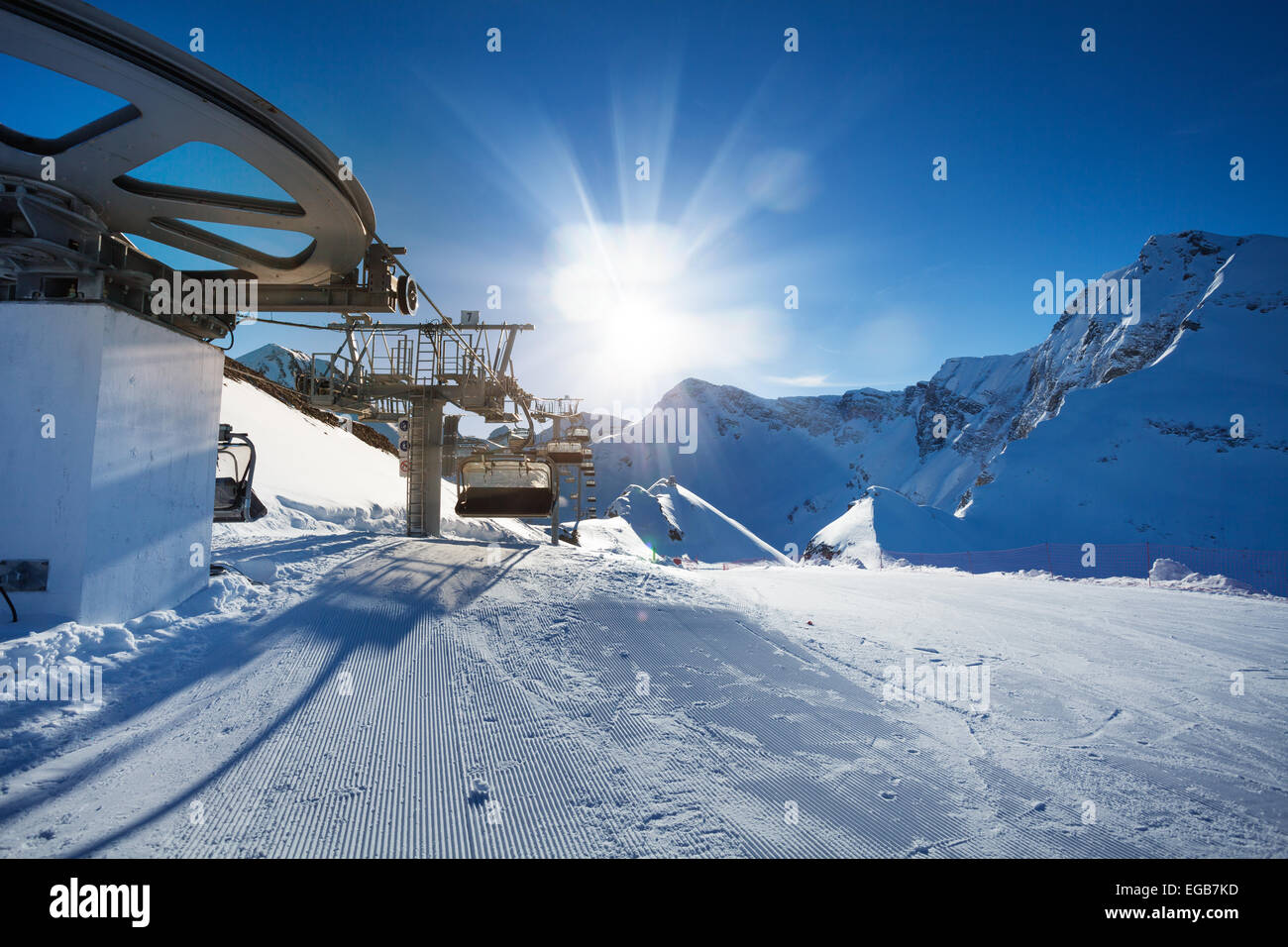 Ski lift near ski-track of Caucasus mountains Stock Photo