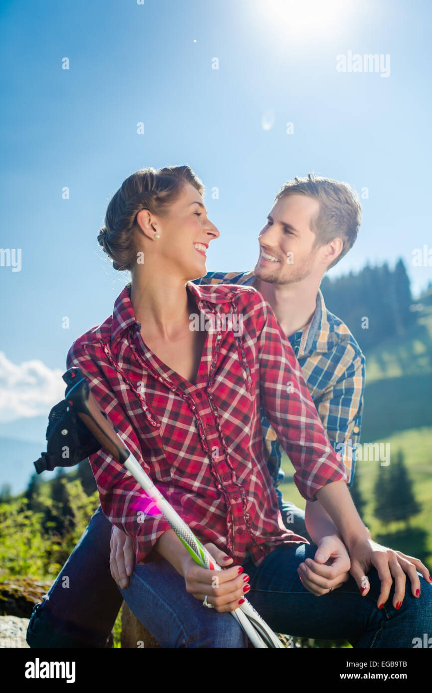 Happy man woman hiking mountains hi-res stock photography and images ...