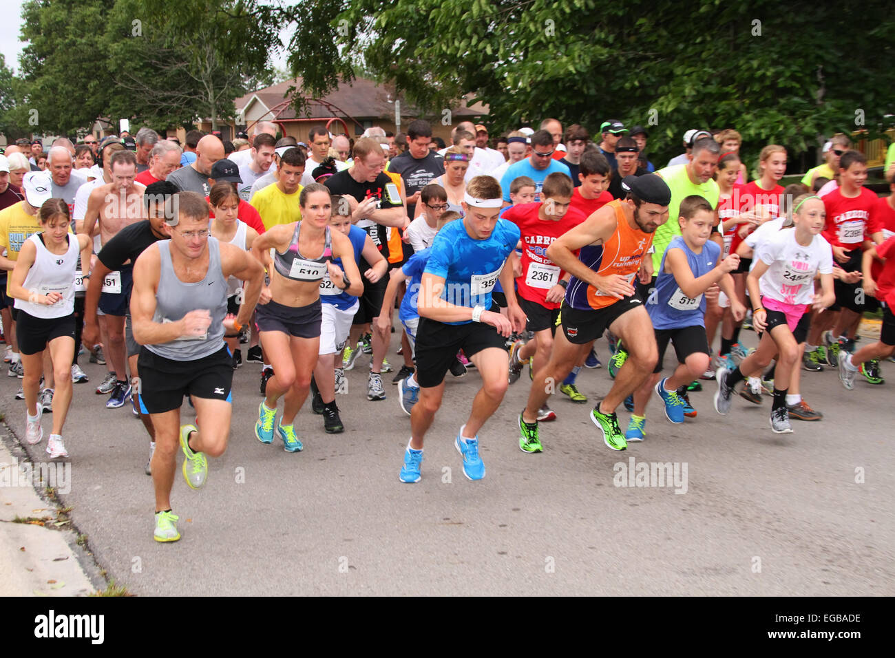 The start of a 5K run or walk sports event. Beavercreek Popcorn Festival, Beavercreek, Dayton, Ohio, USA. Stock Photo