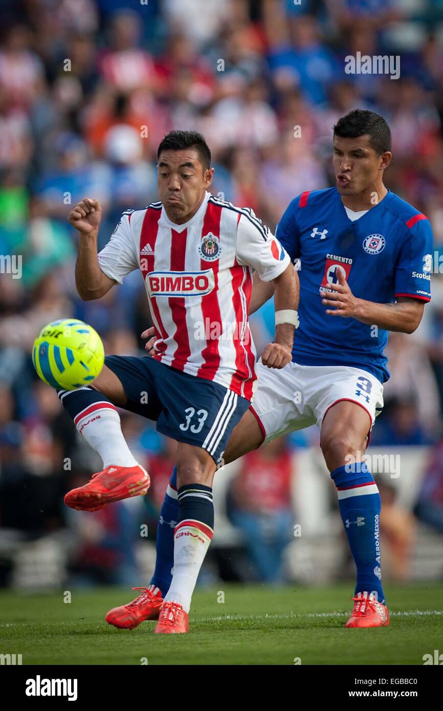 Mexico City, Mexico. 21st Feb, 2015. Cruz Azul's Francisco Rodriguez (R) vies for the ball with Marco Fabian of Chivas during the match of the 2015 Closing Tournament of MX League in the Azul Stadium in Mexico City, capital of Mexico, on Feb. 21, 2015. © Pedro Mera/Xinhua/Alamy Live News Stock Photo