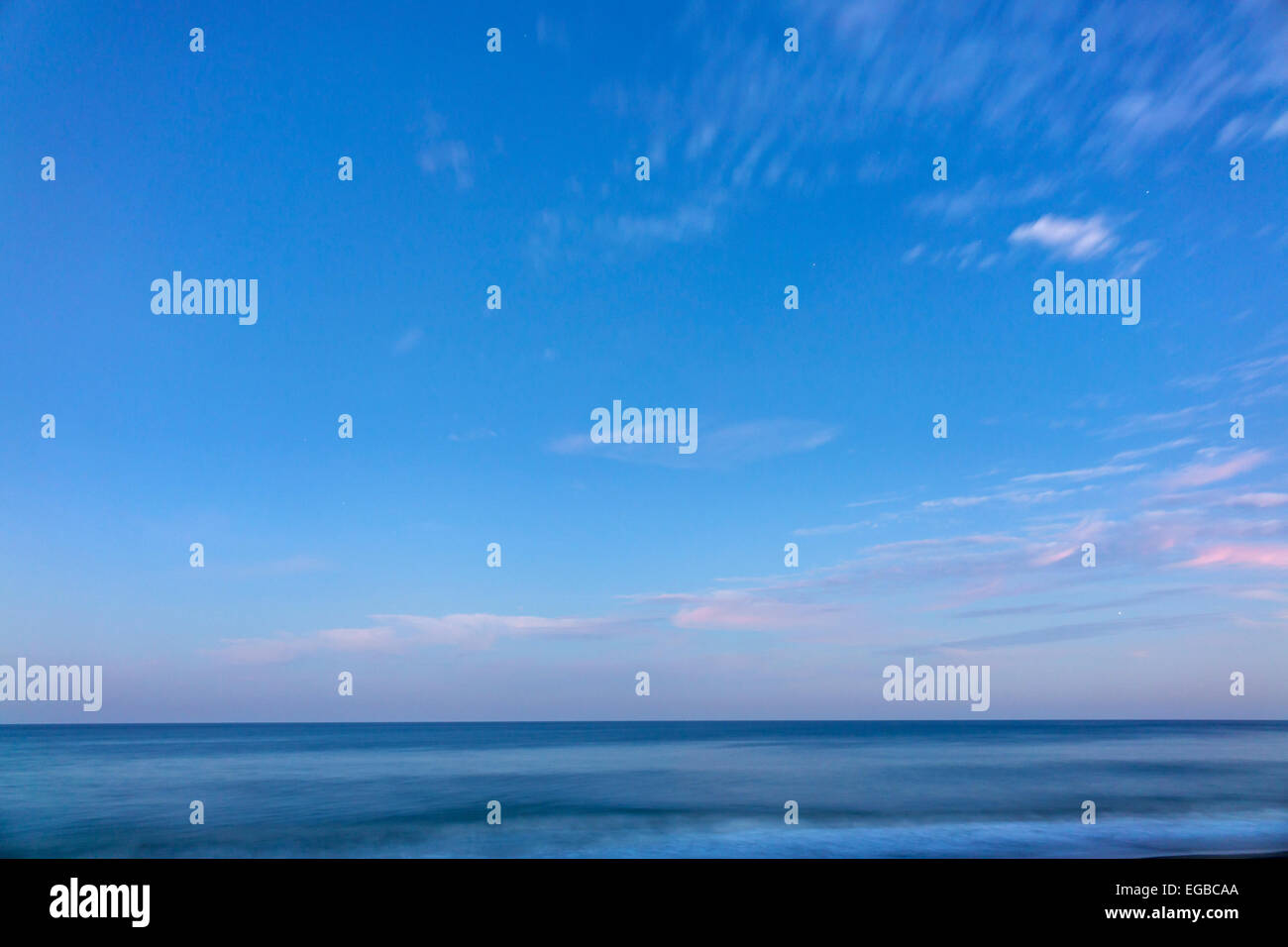 Jensen Beach Florida,Atlantic Ocean water sunset,dusk,sky,clouds