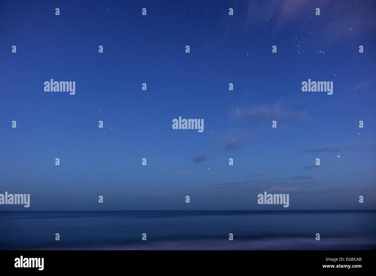 Jensen Beach Florida,Atlantic Ocean water night,dusk,sky,clouds,horizon