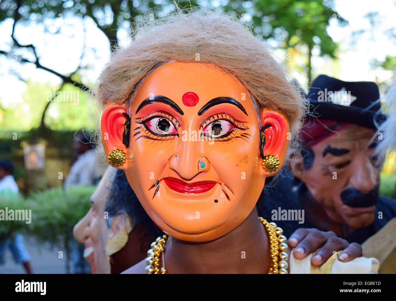 Grandmother Masked man funny mask and wig view at Kerala India Stock Photo