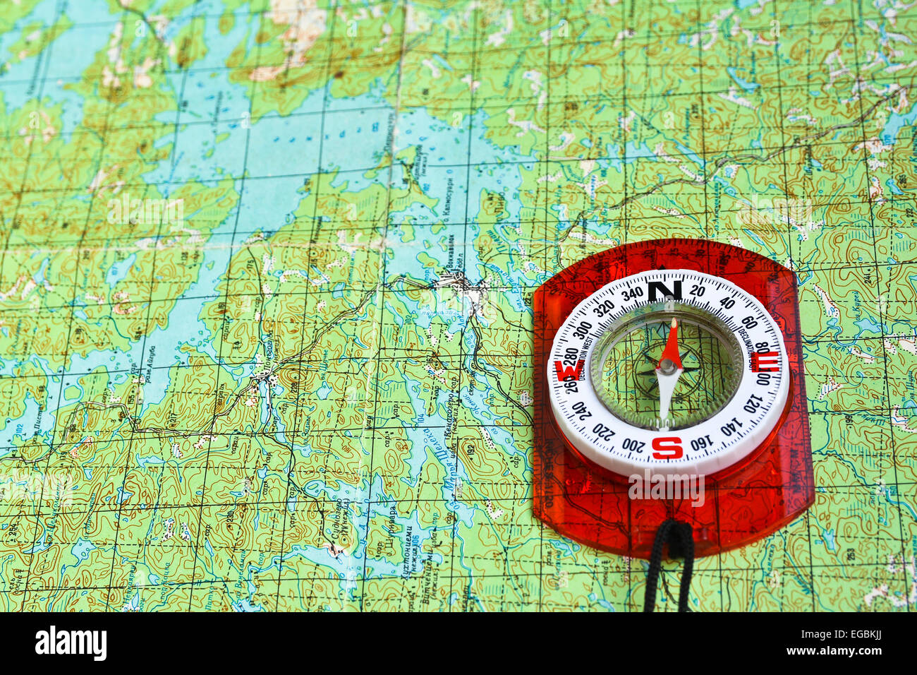 The compass and topographic map. Travel compass and map