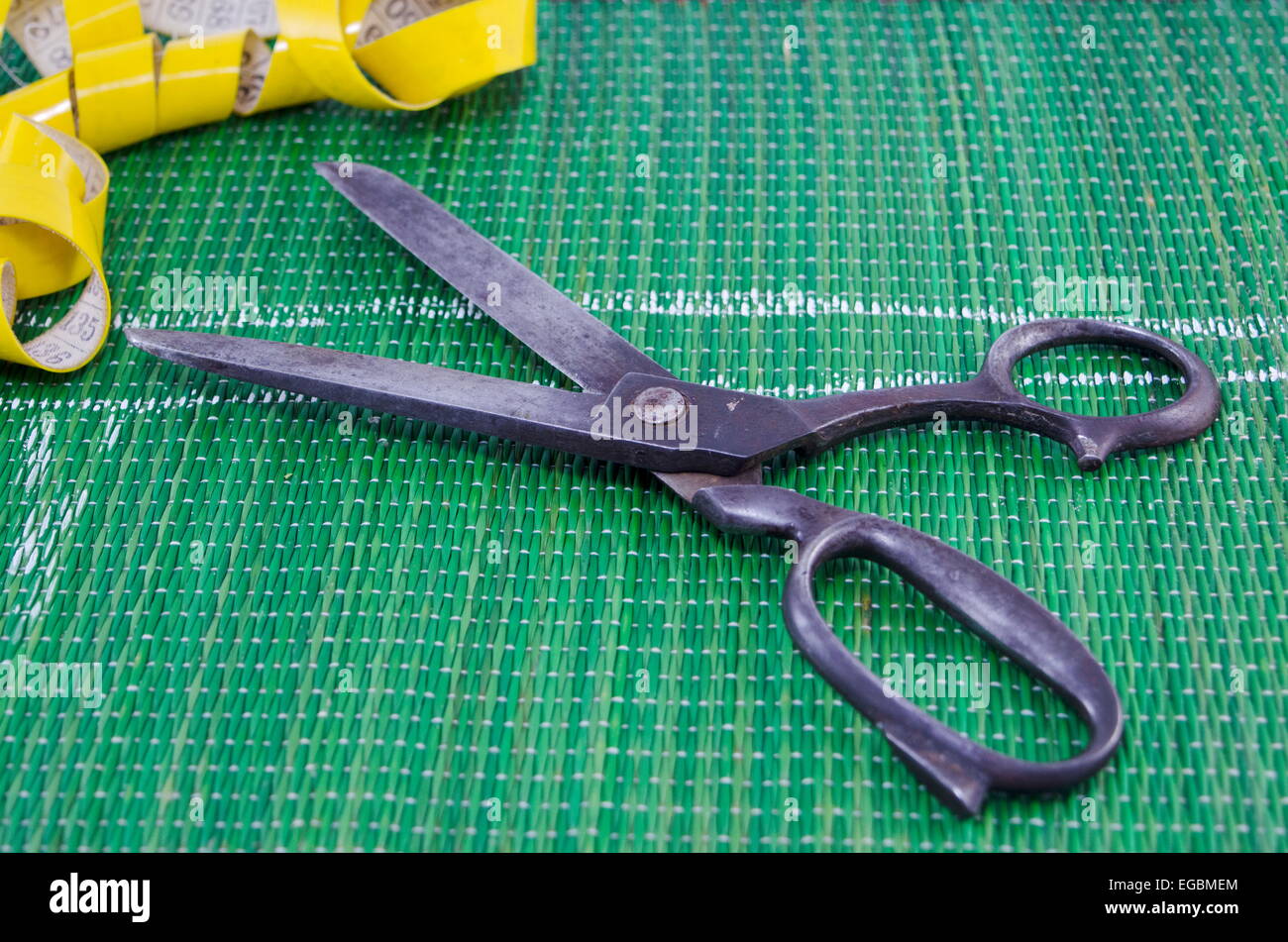 Equipment For Designing Clothes, Measuring Tape, Wooden Scale And Scissors  On Black Fabric Stock Photo, Picture and Royalty Free Image. Image 53653392.